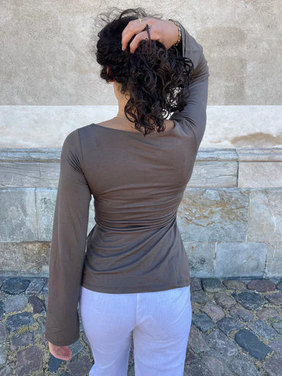 Merle – Blouse élégante avec détail de nœud